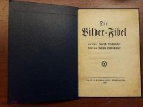 Букварь. Die Bilder-Fibel Josef Tratzmüller, Bilder von J. Lutzenberger Datterer & Cie, 1920, 56 с
